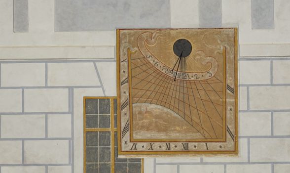 Photo of a Sundial in Cesky Krumlov, Czechia