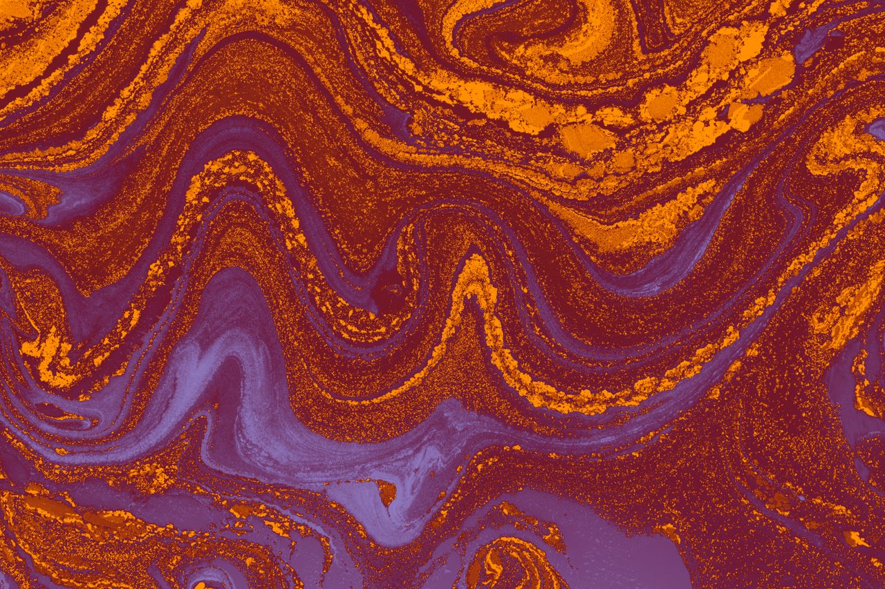 dynamic marbled texture in vivid orange and purple ideal for artistic