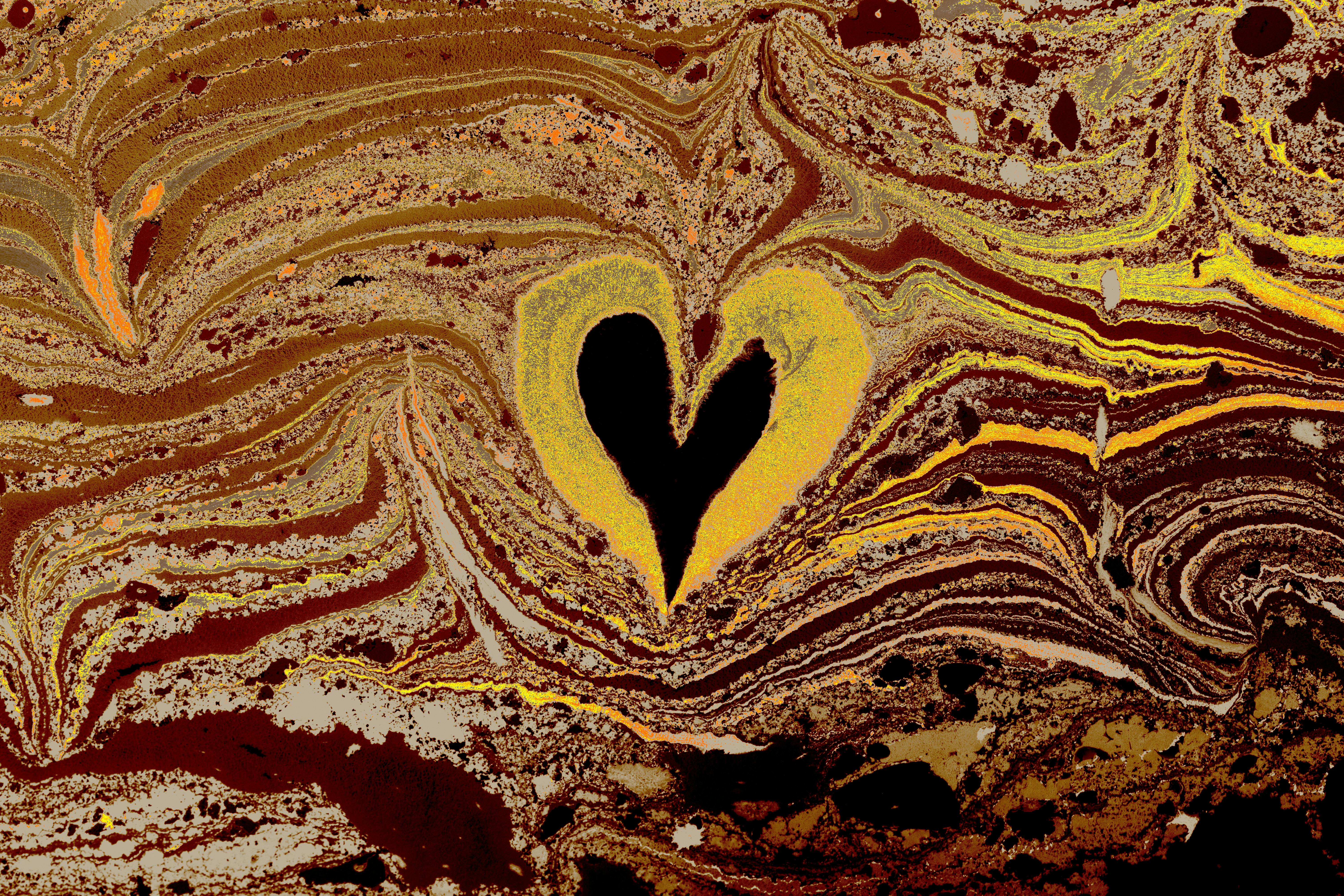 a heart is painted on a marble background