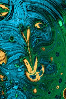 Colorful abstract pattern created using acrylic pouring technique, showcasing dynamic swirls and vibrant hues.