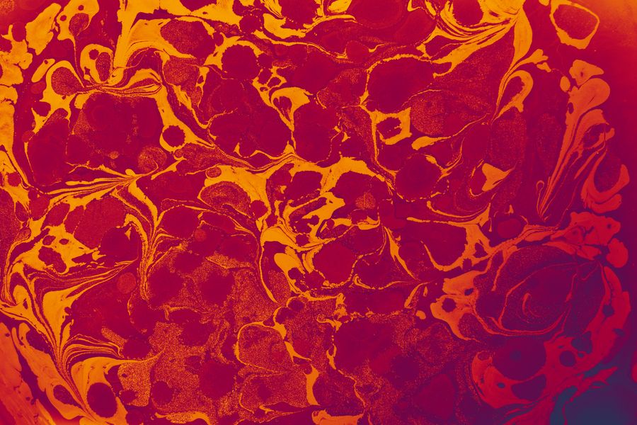 Marbled red and orange swirls — photo by Turgay Koca on Pexels