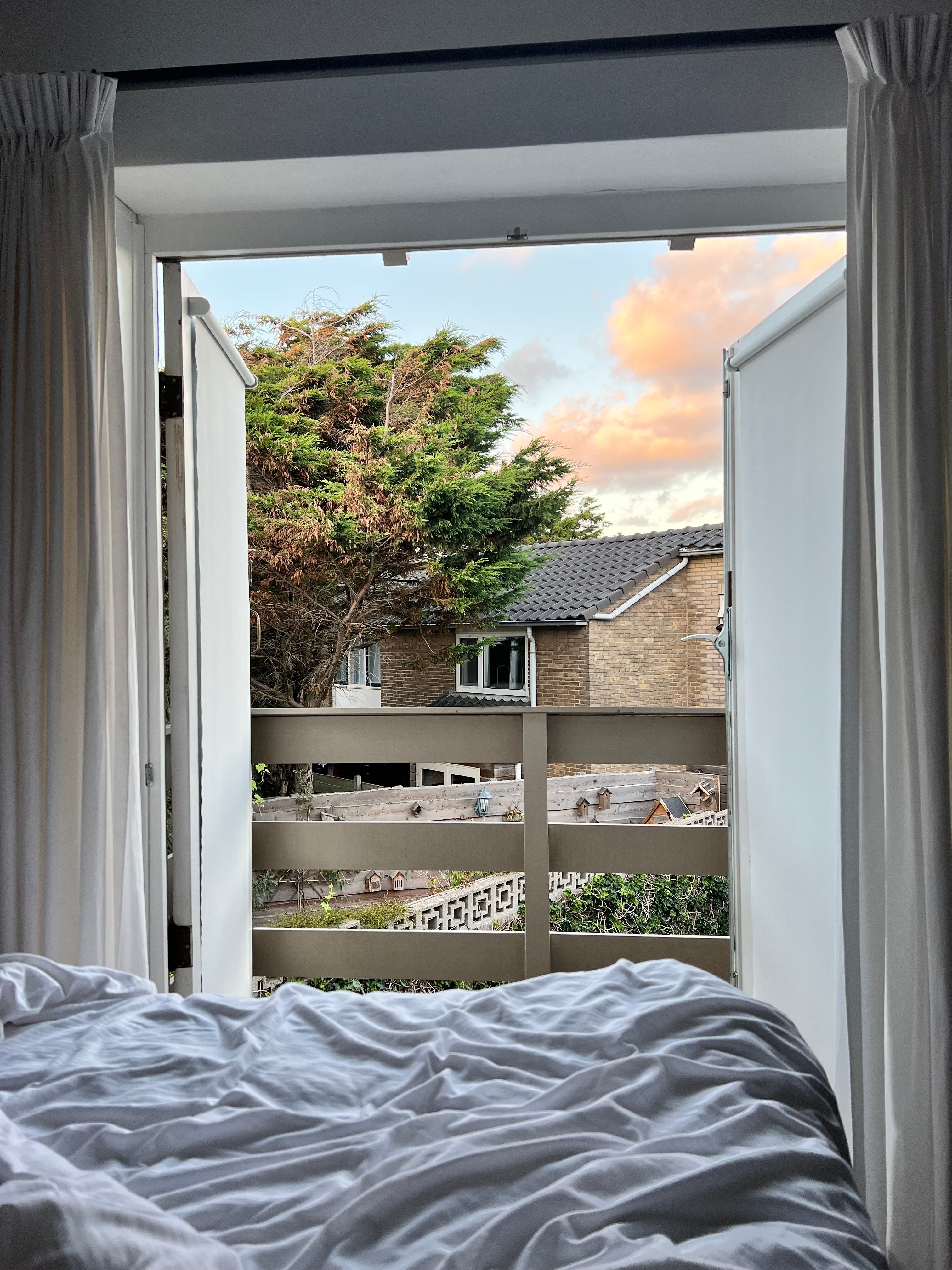 A Bedroom With a City View · Free Stock Photo