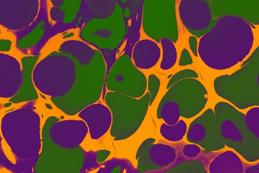 A vibrant abstract design featuring green and purple swirling patterns with an orange background resembling liquid marble art.