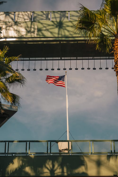 American Flag on Pole on Bridge