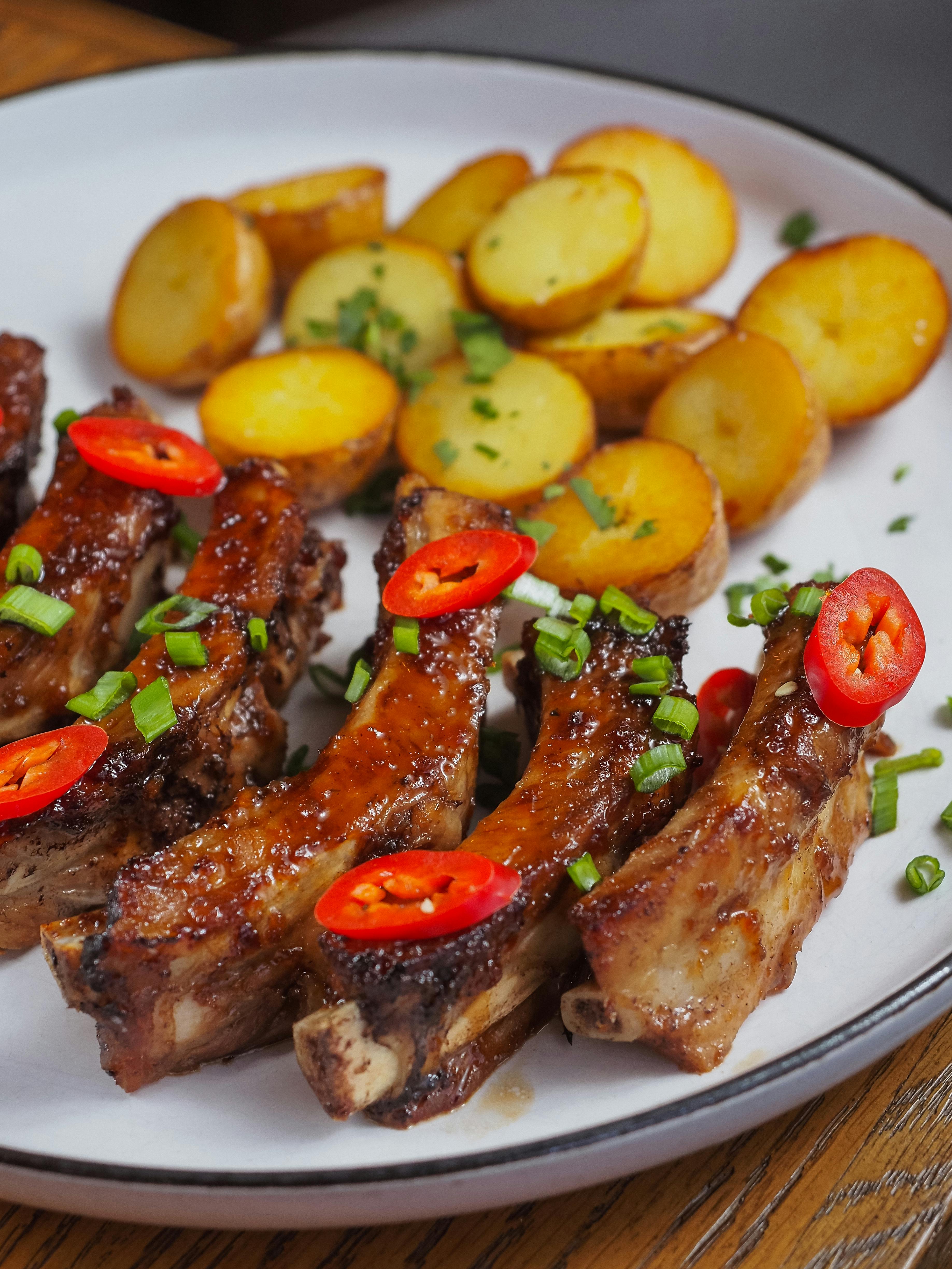Grilled Ribs with Roasted Potatoes and Chili Slices