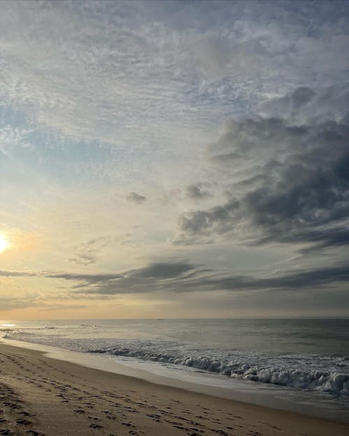 Ilmainen kuvapankkikuva tunnisteilla aallot, auringonlasku, hiekka