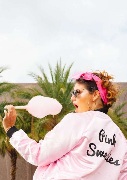 Woman Posing with Cotton Candy