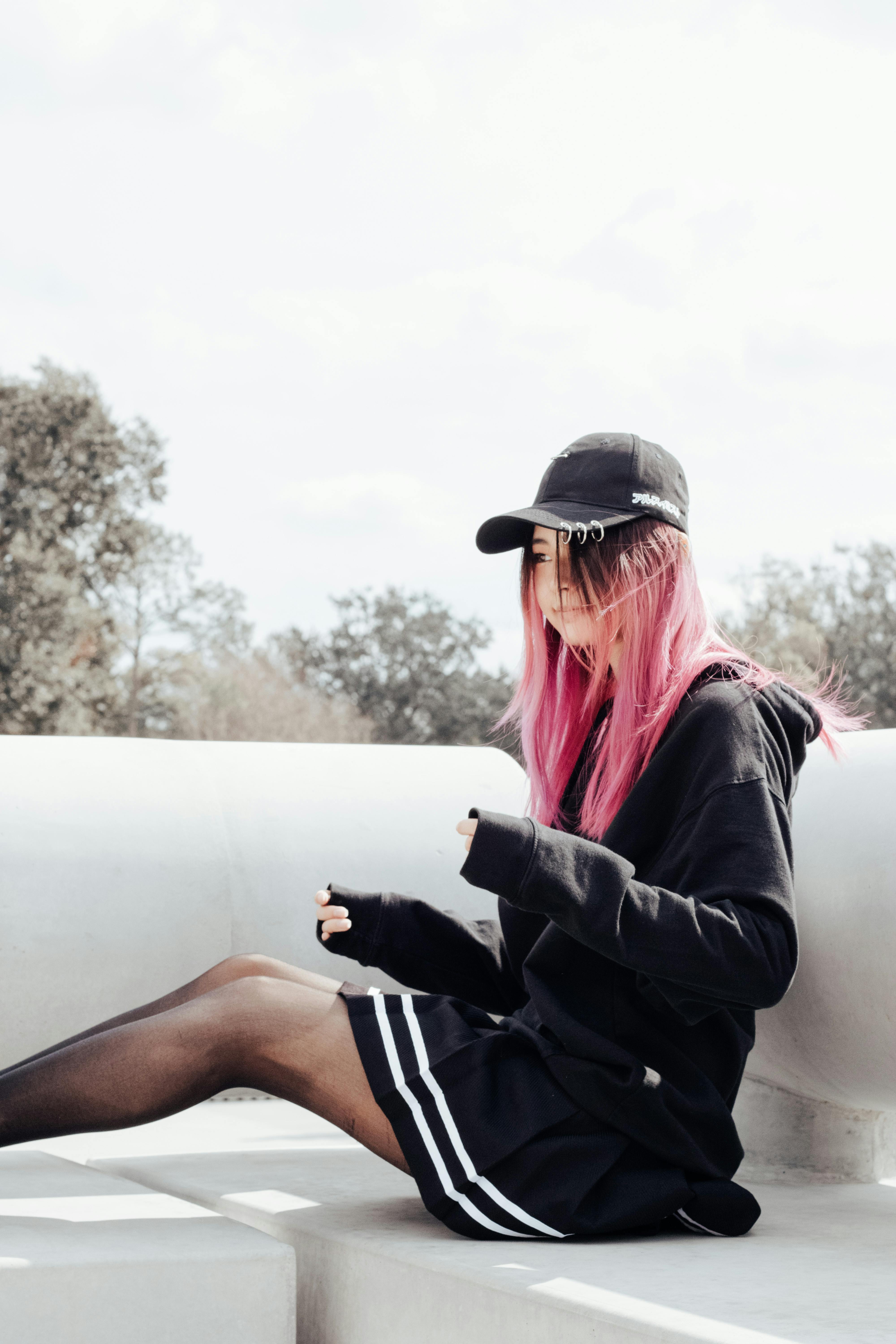 woman in baseball outfit posing free image