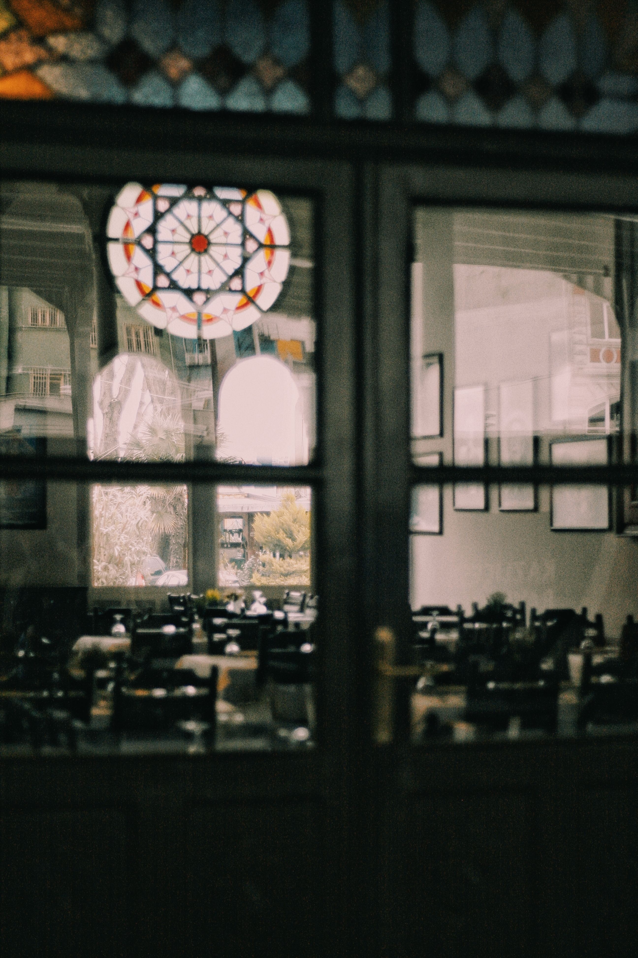 Chairs and Tables behind Windows · Free Stock Photo