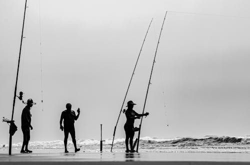 Fishermen on Sea Shore in Black and White