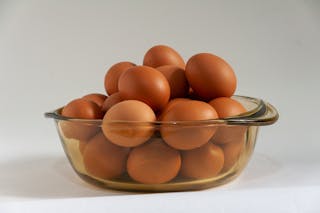 EGGS  IN GLASS CONTAINER