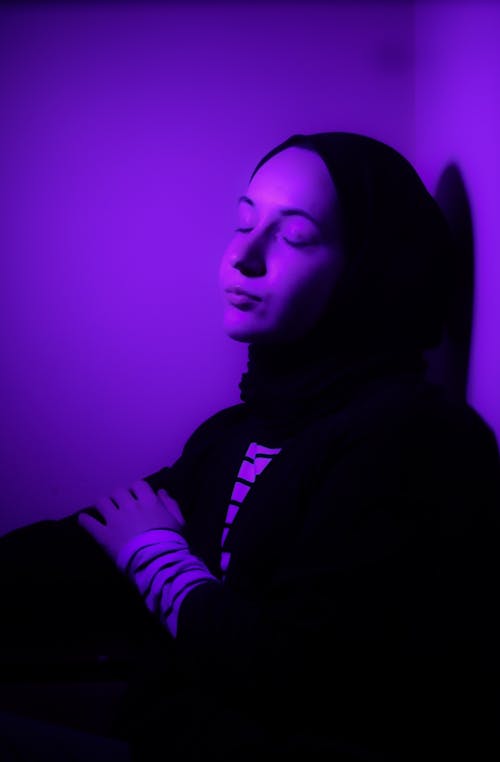 Purple Light on Woman Face