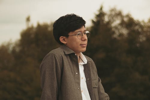 Young Man in Round Eyeglasses 