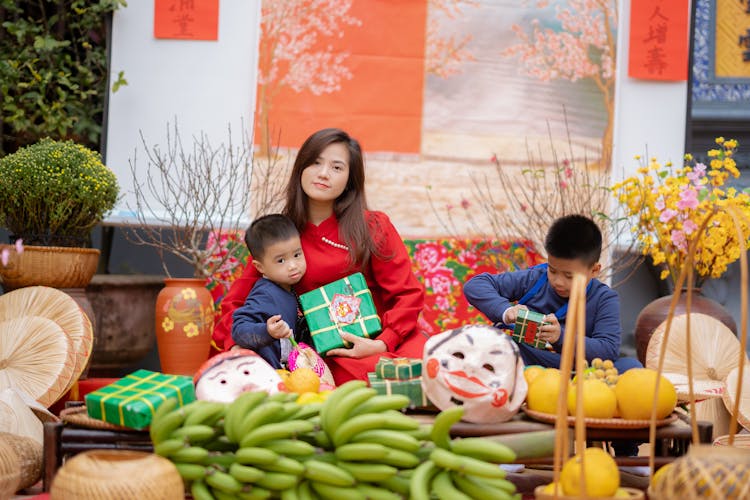 Woman With Children In Traditional Restaurant