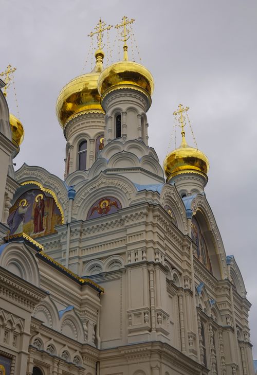 Free Elegant Orthodox cathedral with golden domes and intricate facade in Karlovy Vary, Czechia. Stock Photo