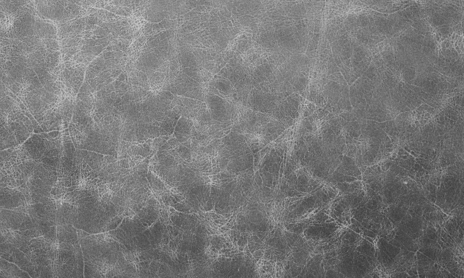 detalle de una superficie sintética lisa y uniforme similar a la polipiel