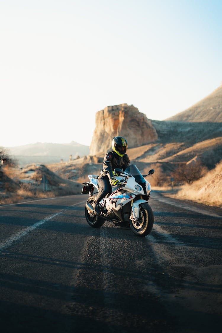 Man On The Motorcycle On The Highway