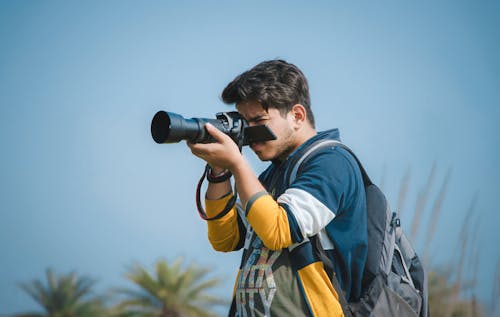 Fotobanka s bezplatnými fotkami na tému držanie, fotoaparát, fotograf