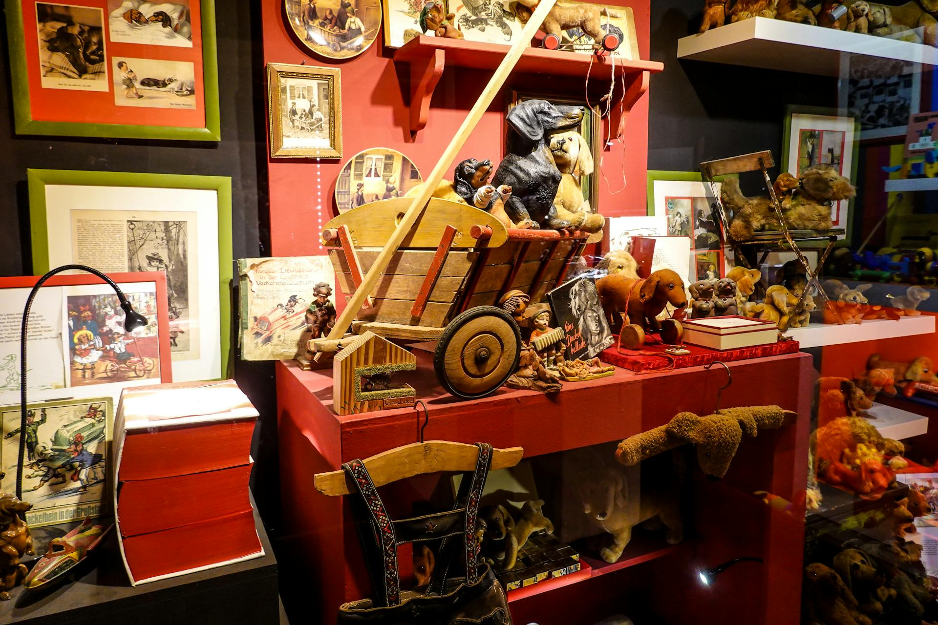 Dachshund Figurines in Wooden Cart on Cabinet