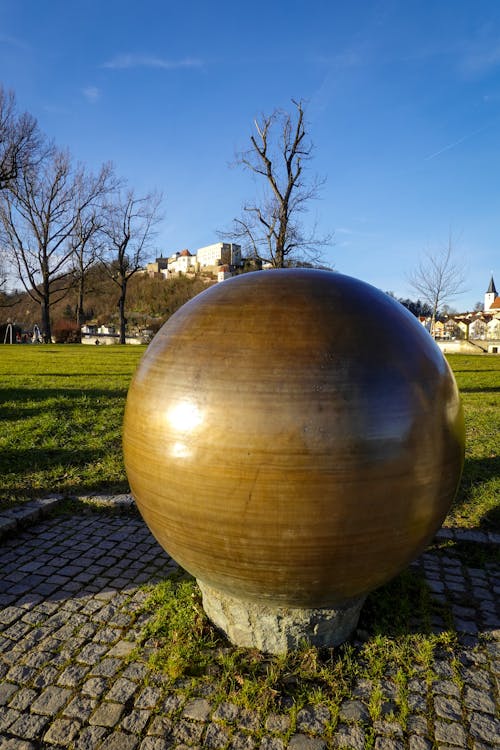 Free A Ball Statue in a Park  Stock Photo
