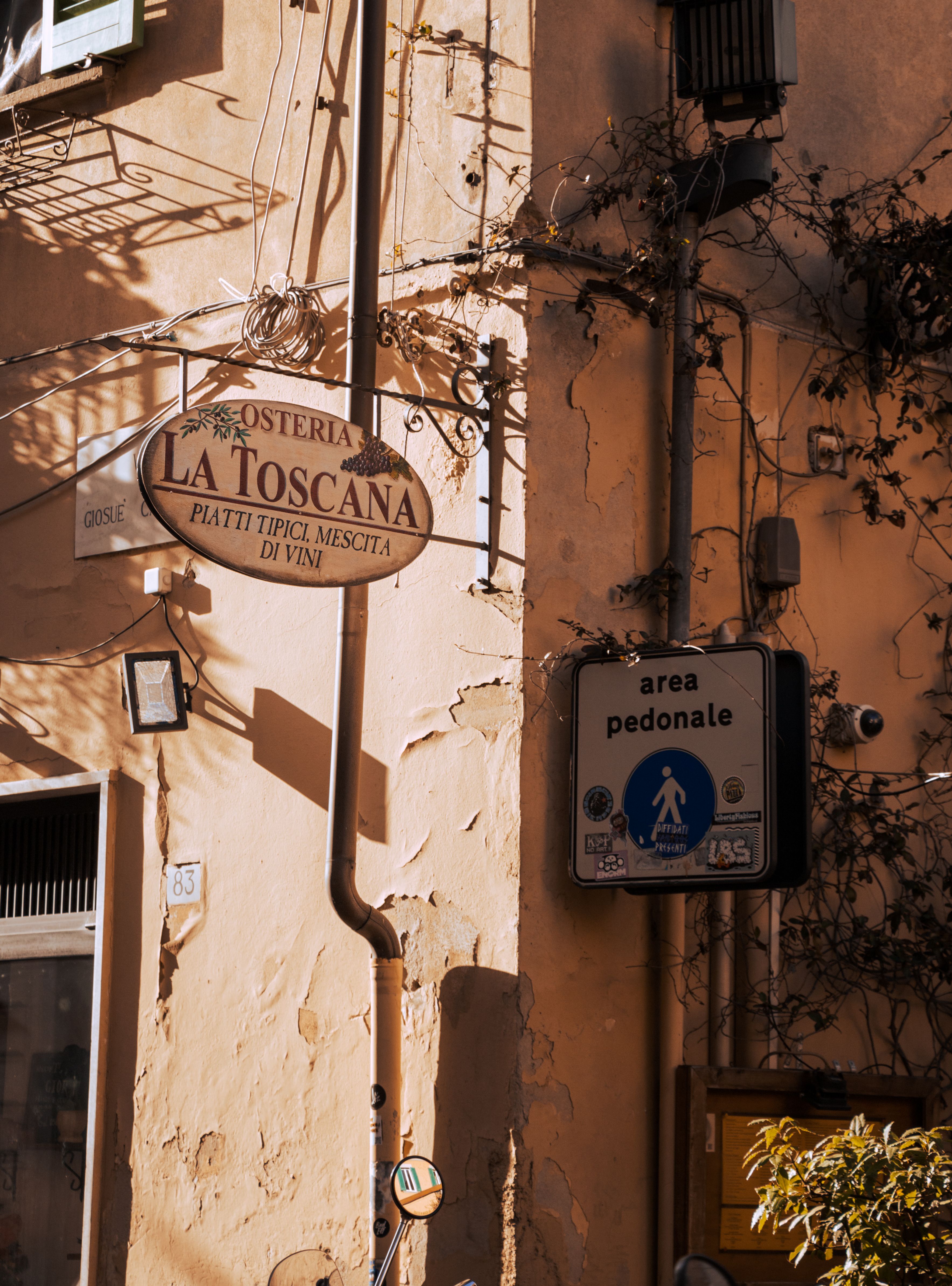 Sign Hanging on Wall in Pisa, Italy · Free Stock Photo