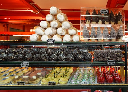 Free Variety of Baked Goods on Display in a Bakery Stock Photo