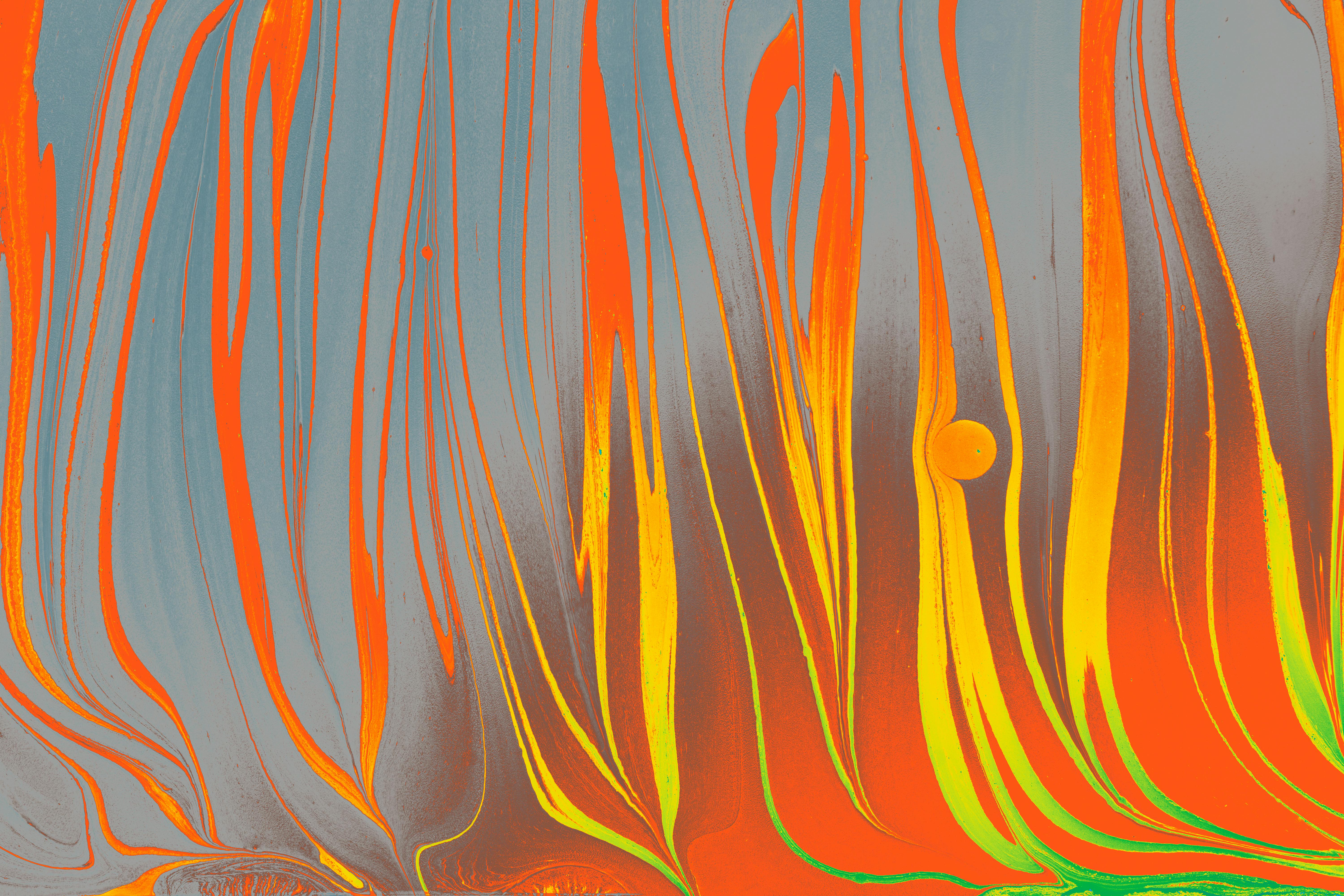 Dynamic abstract marbling artwork with vibrant orange and yellow swirls on a muted background.