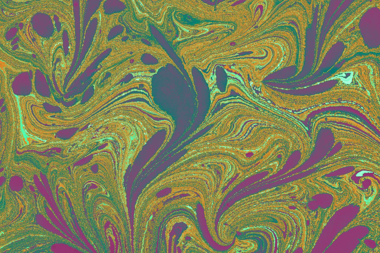 colorful marbled patterns with a vibrant mix of gold green and purple