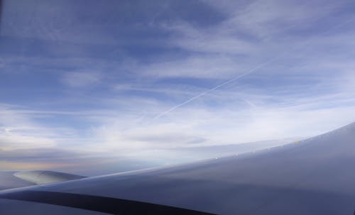 Cloudscape and Plane Wing