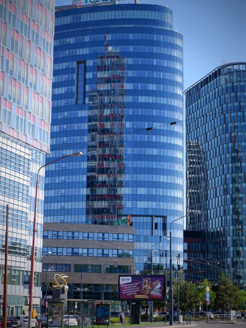 Free Modern skyscrapers reflecting city life in Bratislava's downtown district. Stock Photo