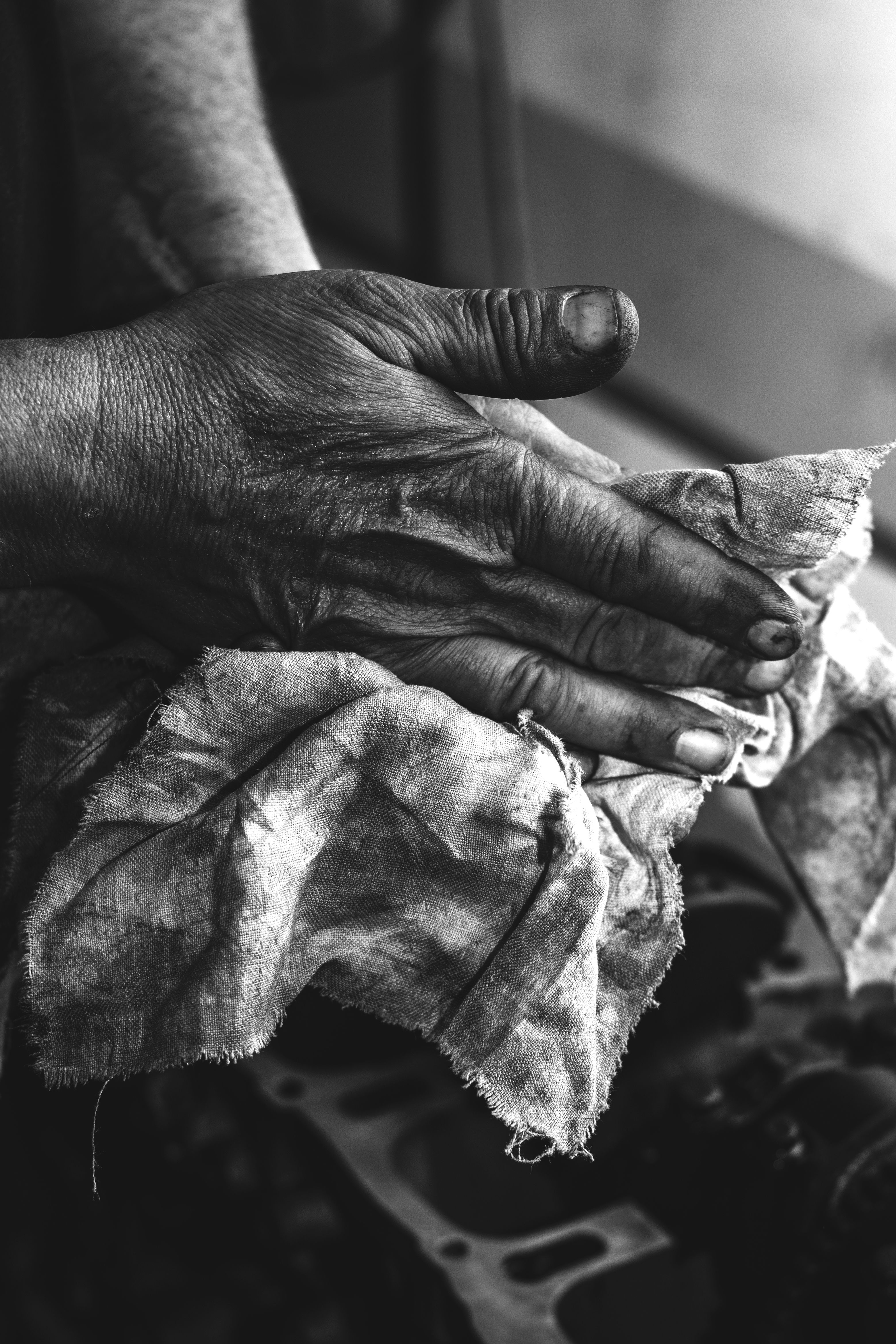 Close-up of Person Wiping Their Hands with a Cloth · Free Stock Photo