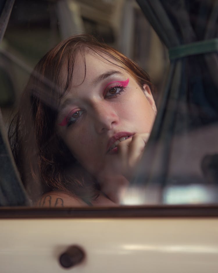 Portrait Of A Woman With Pink Eyeshadow