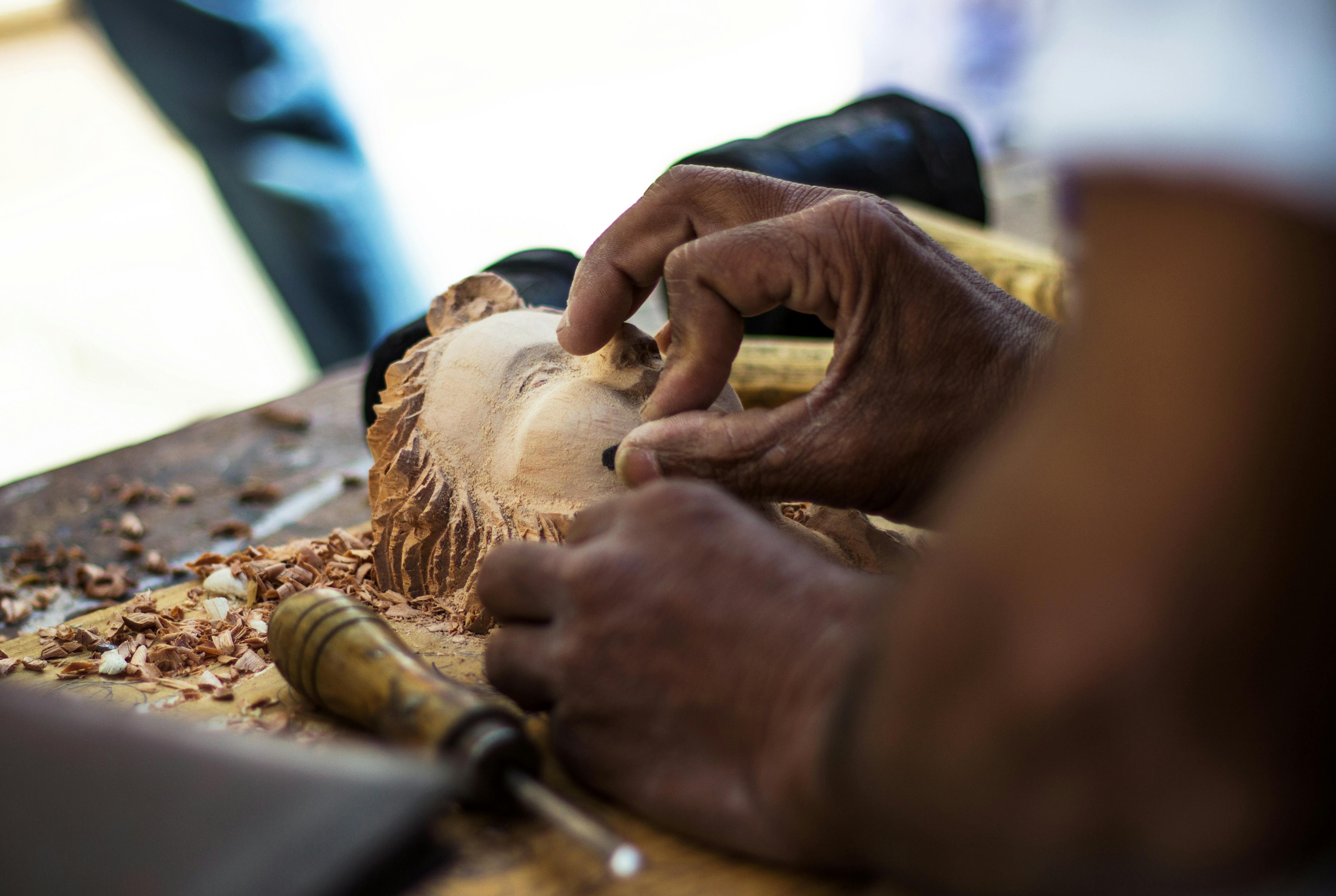 Free stock photo of art, carved wood, hands