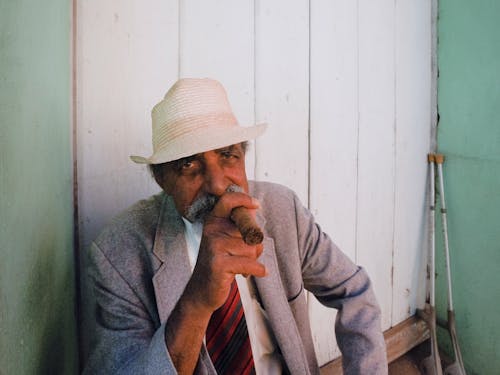 Elderly Man Smoking a Cigar