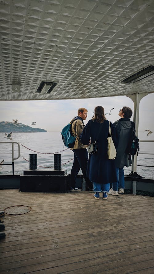 Friends Standing on a Deck 