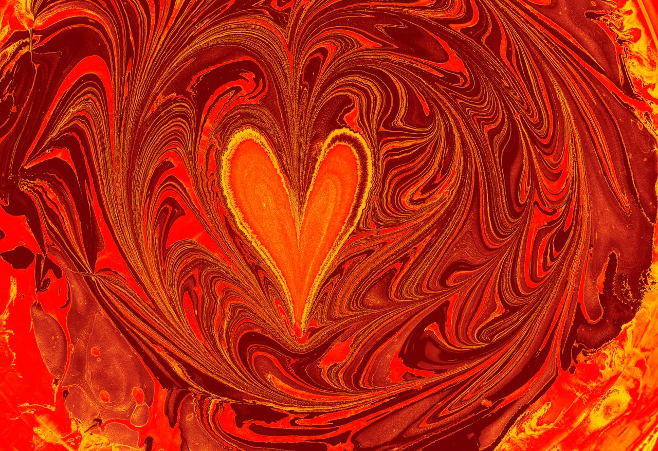 dynamic abstract design featuring bold red and orange swirls with a he