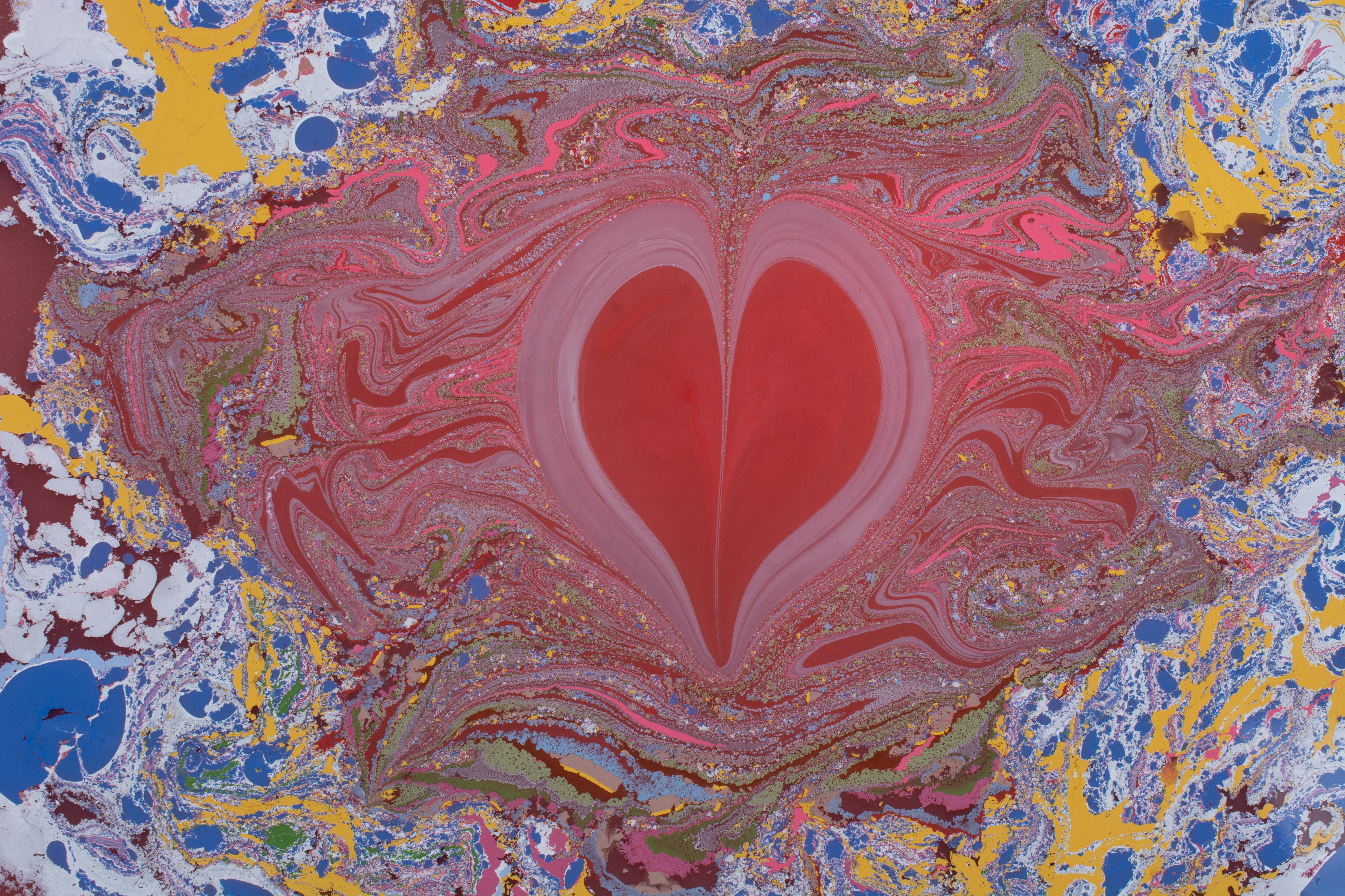 a painting with a heart in the center