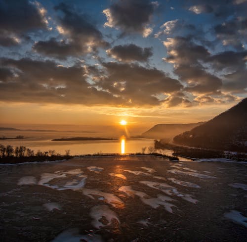 Free Scenic View of a River during Golden Hour Stock Photo