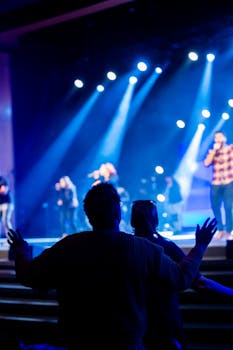Vibrant live concert scene with a captivated audience enjoying the show.