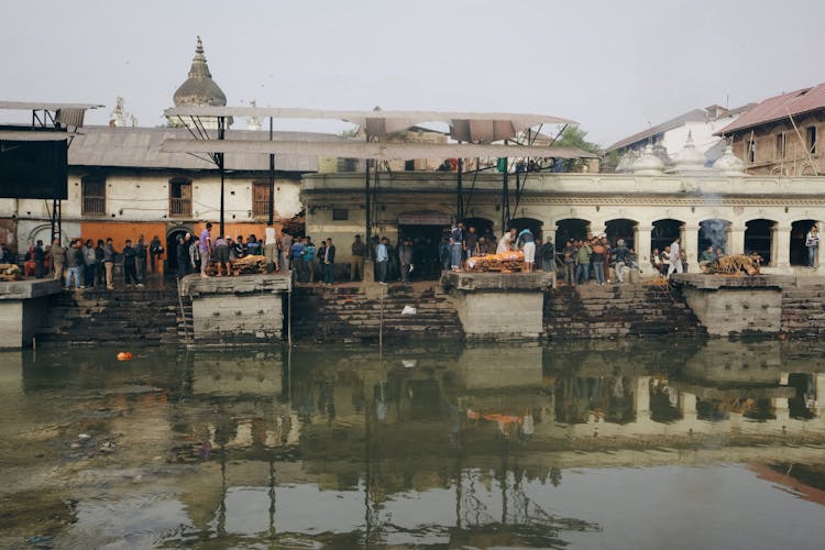 People Giving An Offering To The Gods