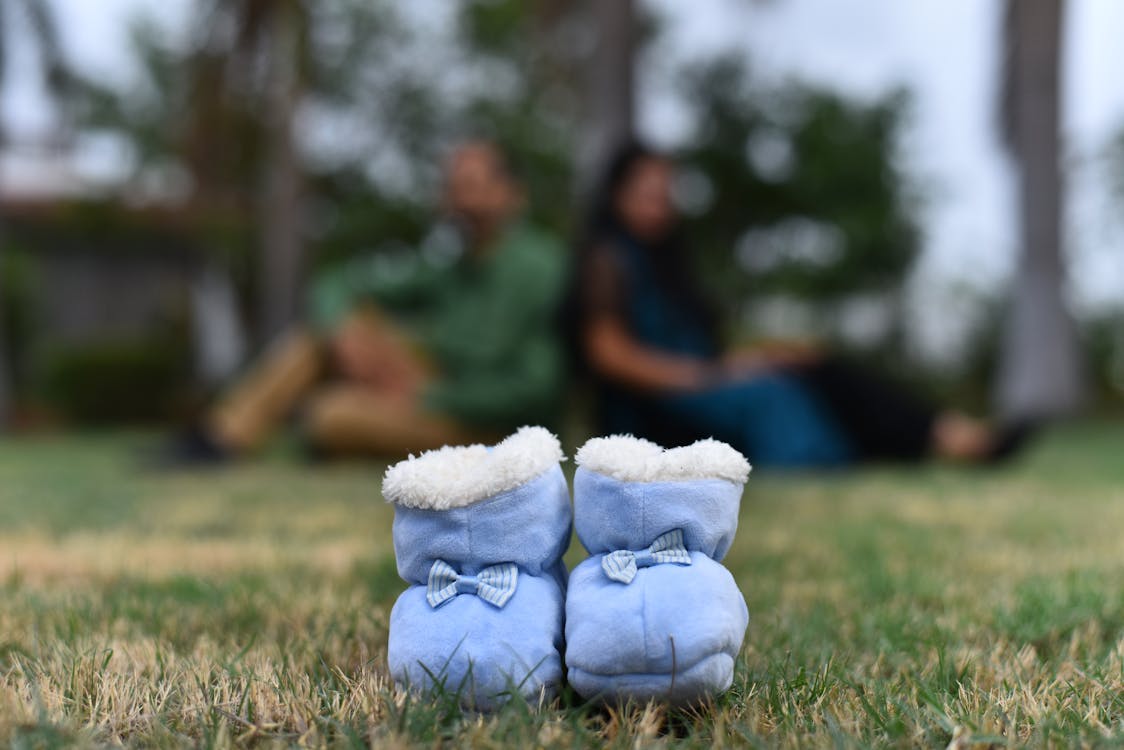 Free Close-up of Baby Shoes on Grass Stock Photo