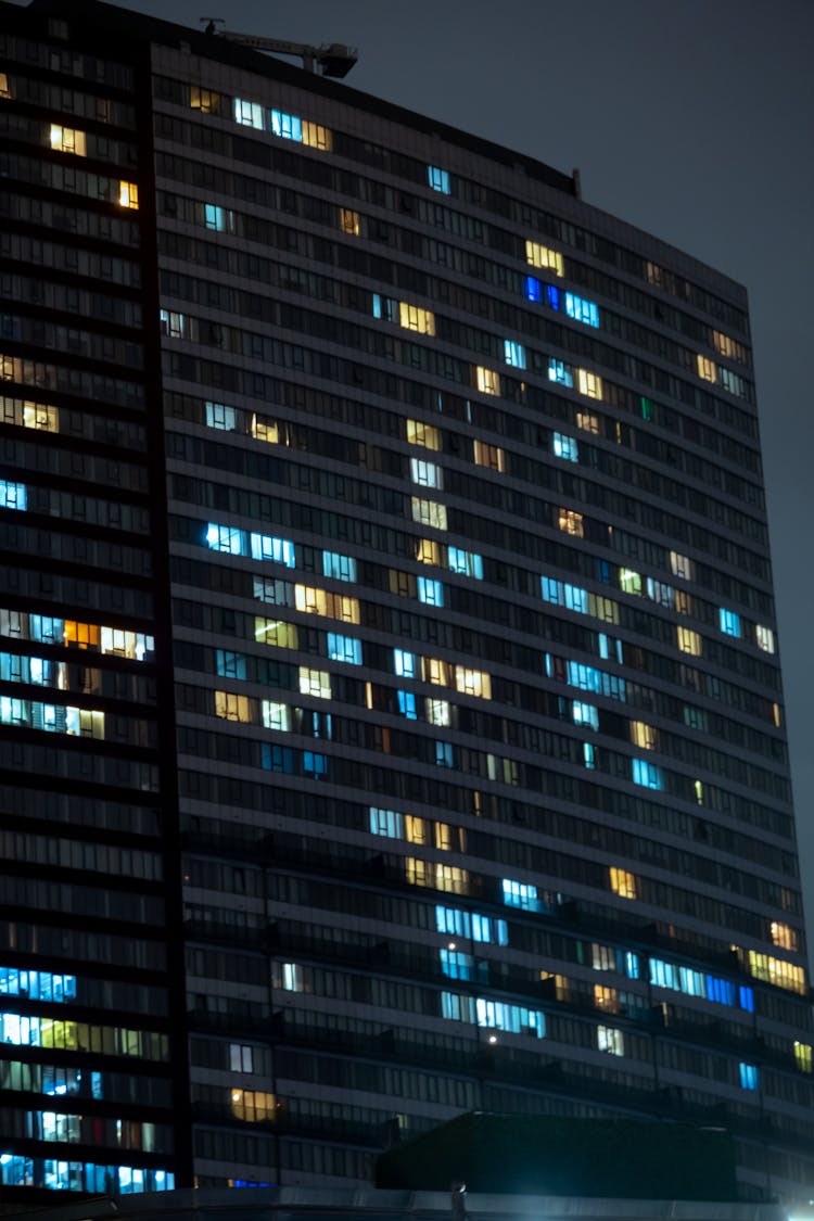 A Skyscraper Facade At Night