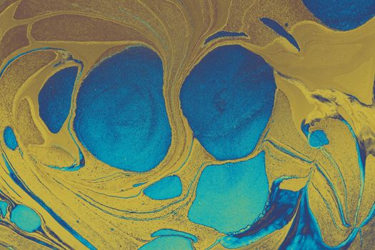 Dynamic abstract pattern with vibrant blue and yellow colors, creating a fluid swirl effect.