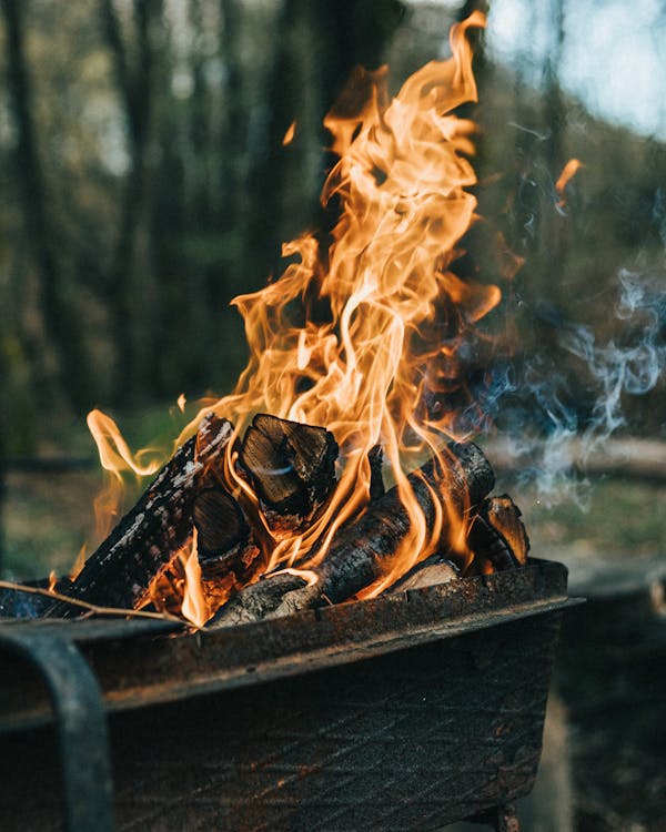 Burning Woods on Metal Container