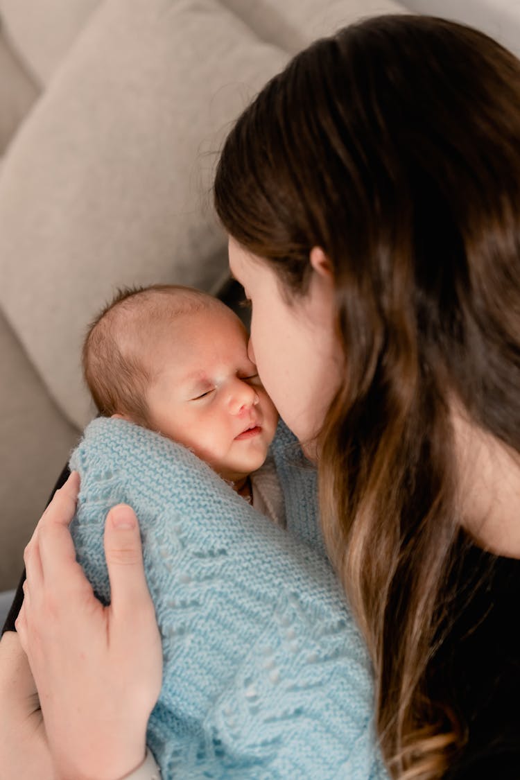 Mother With Sleeping Baby