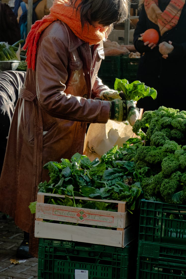 Customer Shopping On Fresh Produce Market