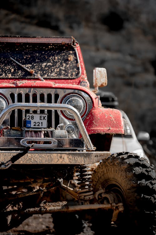 Red 4x4 Car in Close-up Photography 