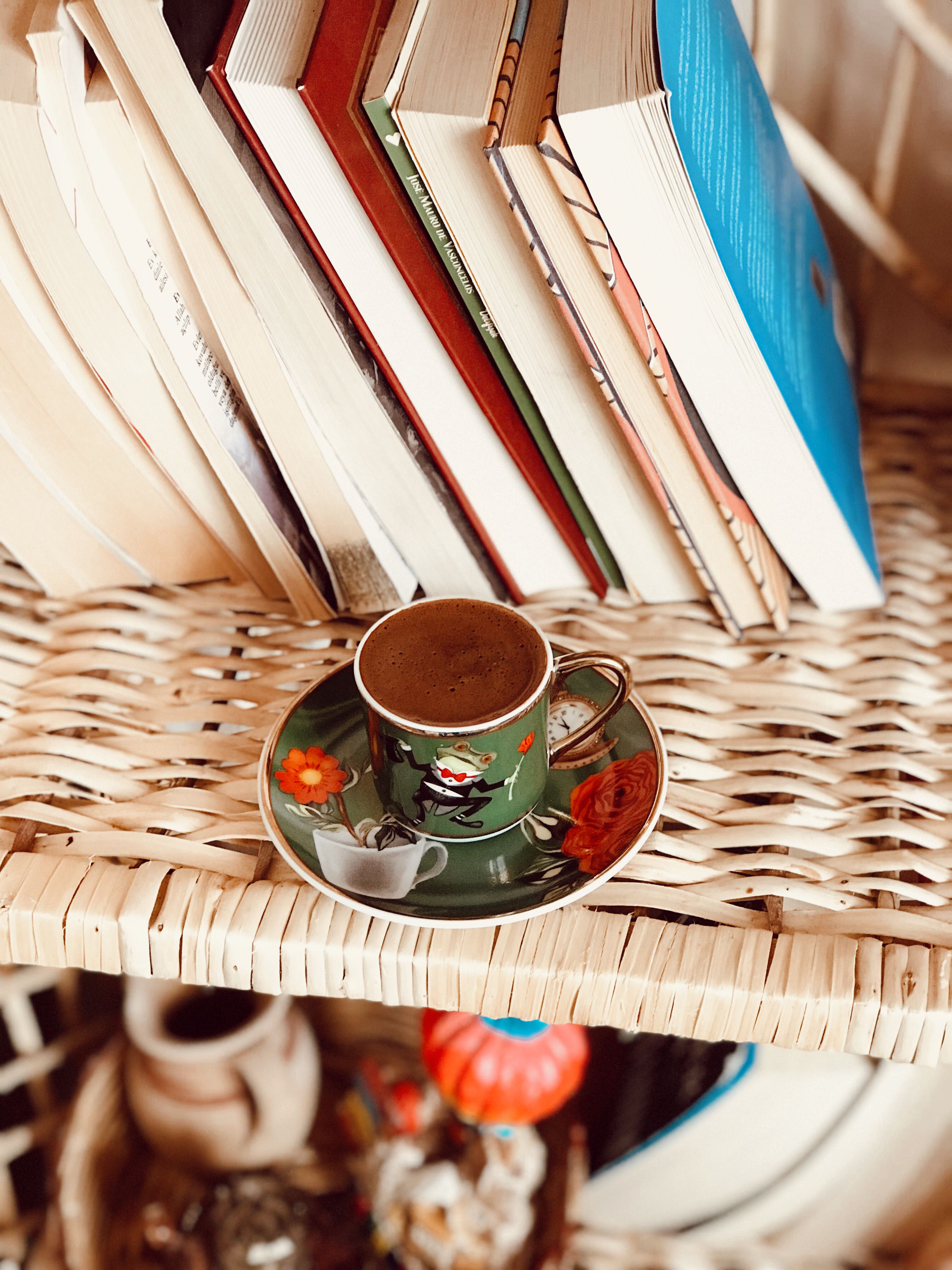 armoire with woven rattan front panel adding texture to a coffee station
