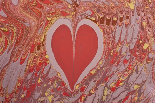 Colorful abstract pattern with a central red heart shape, perfect for creative backgrounds.