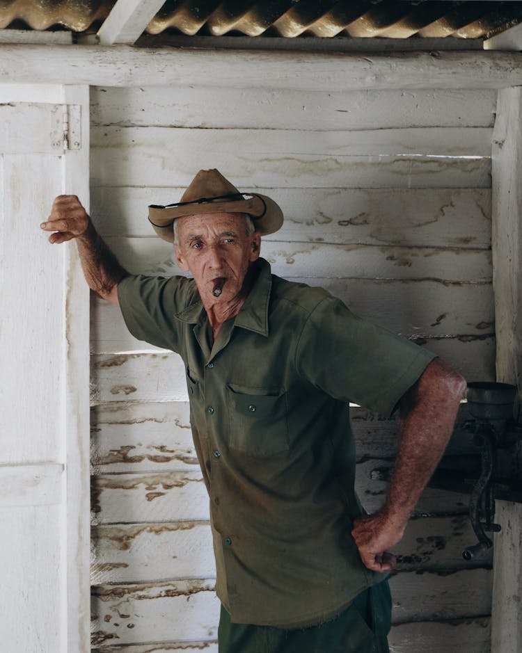 Elderly Man Smoking Cigar 